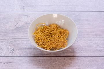 Noodles are made from rice flour, wheat flour, and eggs. They are white and yellow.