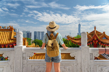 Female tourist is enjoying view of Kuala Lumpur, Malaysia