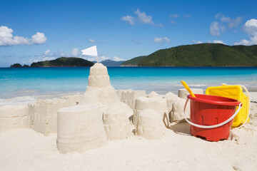Sandcastle and buckets on Cinnamon Bay Beach