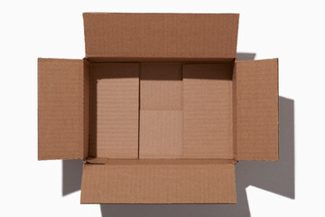 Overhead view of open empty cardboard box