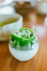 iced matcha latte tea with milk..