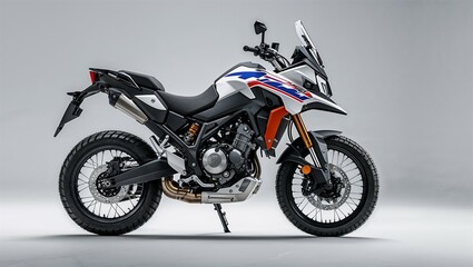 Obraz premium Dual-sport motorcycle side profile with off-road tires and high ground clearance on white background 