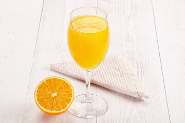 Sweet fresh orange juice in the glass