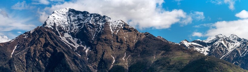 Majestic panorama of Monte Legnone, the highest peak of the Orobie Alps' western ridge, showcasing its rugged slopes and commanding presence over Lake Como region, Lombardy, Italy