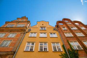 Old town in the Polish city of Gdansk with colorful facades of houses, Poland. Street architecture with old building. Travel photography.