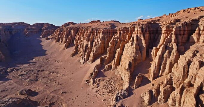 Aerial view of the yardang landform mountain in desert. Famous Dahaidao no man's land natural landscape in Xinjiang, China.