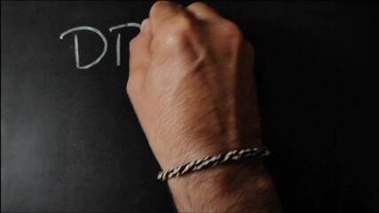 hands of a man writting marketing strategy quotes