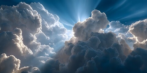 Sunlight rays beam through fluffy white and grey cumulus clouds against brilliant blue sky. Dramatic lighting creates ethereal, heavenly scene. Photorealistic.