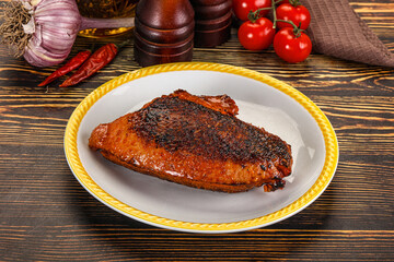 Roasted duck breast in cherry