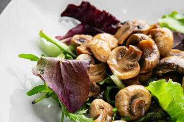 Mushrooms pickled champignon salad snack fresh delicious gourmet food background on the table rustic food top view copy space keto and paleo diet vegetarian and vegan food