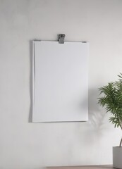 Stylish white wall, poster mockup on metal clips,  visual,  contemporary