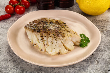 Baked cod fish fillet with spices
