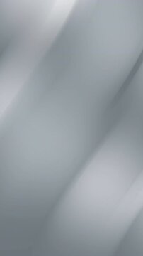 Simple silver gradient vertical background with a few shadows. Suitable for minimalist designs, website backgrounds, and modern social media posts.
