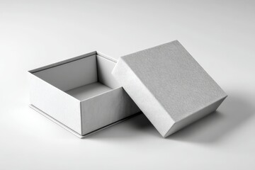 Minimalistic gray open box on a light surface showcasing simplicity and elegance in design, perfect for storage solutions or gift presentation