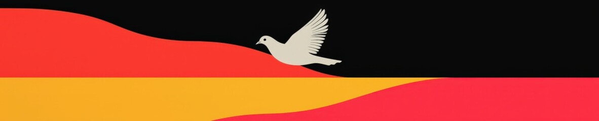 Fototapeta premium A bird is flying over a red, yellow, and black flag