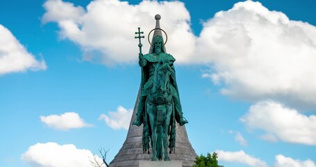 Budapest, Hungary - April 19, 2025: St. Stephen’s Monument Under a Blue Sky. Timelapse.