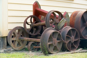 Rusty Mining Cart Wheels and Axles – Remnants of Industrial Heritage