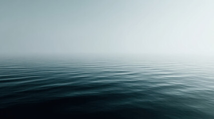 aerial view of serene mirrorlike ocean surface shrouded in thick fog creating mystical atmosphere