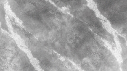 Abstract gray marble texture with subtle white veining, creating a sophisticated and elegant background suitable for various design applications and artistic projects