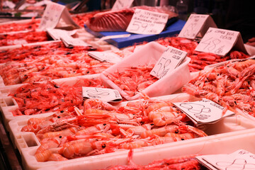 red shrimps with price tags at Alicante market