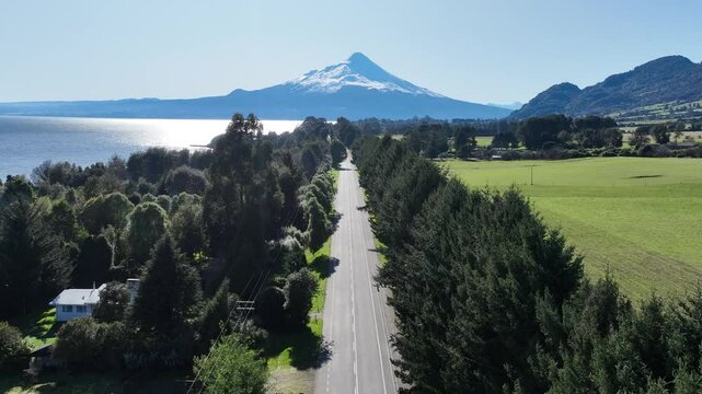 Patagonia Road In Puerto Octay Los Lagos Chile. Breathtaking Aerial View Of Busy Traffic In A Freeway Road. Outdoor Travel Patagonia Glacier. Landmark Patagonia Aerial View Floresta.