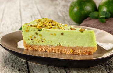 Green pistachio cheesecake served mint