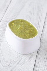 White bowl of salsa verde with zesty vibrant green and clean finish