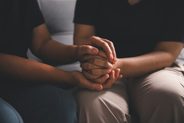 Hope and trust with crisis concept. Closeup, love and holding hands for support, comfort and care...