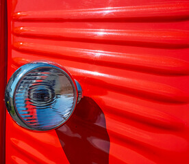 Red van and headlight