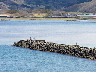 Fishing scene at Monju Beach tourist spot in Kaminokuni, Hokkaido