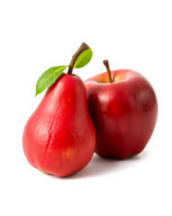 Fresh red pear with a green leaf next to a red apple, both isolated on a white background, showing a bright color and smooth texture. 