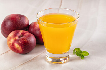 Vitamin beverage - peach juice glass