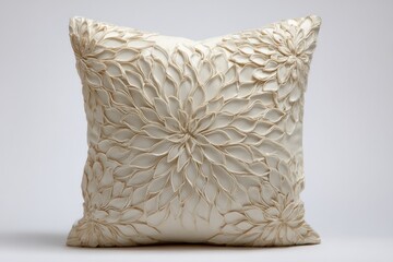 Obraz premium Elegant decorative pillow featuring intricate floral design, perfect for enhancing home décor styles and themes