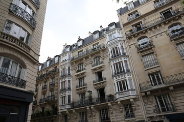Classic European Residential Building with Ornate Balconies and Dormer Windows