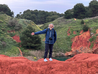 mature man at the bauxite quarry of Otranto