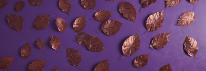 Oxidized copper leaves scattered on purple  Geometric leaf arrangement , background, abstract, orange