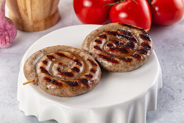 Grilled beef round circle sausages