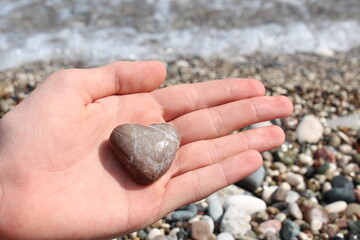 hand holding stones