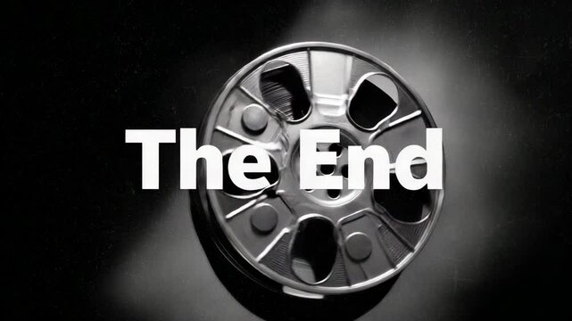 A classic monochrome cinematic ending featuring "The End" text with film reel. A nostalgic visual, evoking the closure of a movie experience. 