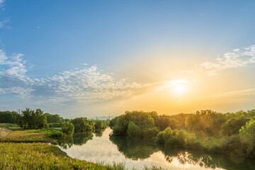 Obraz premium autumn landscape with river and trees 