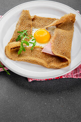 Galette sarrasin fried egg in crepe Breton galette galette complete fresh delicious gourmet food...