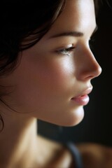 Fototapeta premium close-up profile portrait, fine lighting, expressionless, soft bokeh