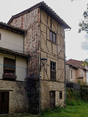 Traditional basque country architecture displaying timber framing and stone walls