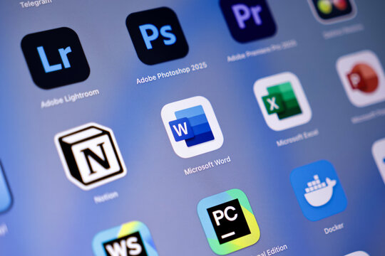 The Microsoft Word app icon stands out prominently on the tablet screen, representing digital word processing software and essential mobile application productivity for users daily tasks