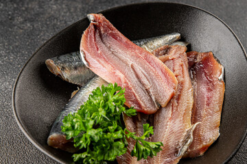 Sardine raw fish fillet seafood anchovy filet fresh delicious gourmet food background on the table...