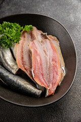 Sardine raw fish fillet seafood anchovy filet fresh delicious gourmet food background on the table rustic food top view copy space pescetarian diet
