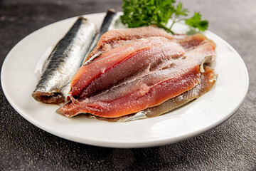 Sardine raw fish fillet seafood anchovy filet fresh delicious gourmet food background on the table rustic food top view copy space pescetarian diet