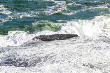 Ipanema Beach Water Waves and Rocks Rio de Janeiro Brazil.