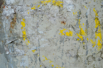 dirty gray surface with yellow streaks