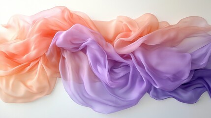 Fototapeta premium Translucent flowing fabric in peach and purple hues on a white background. It's suitable for use in beauty, fashion, or ethereal concepts.